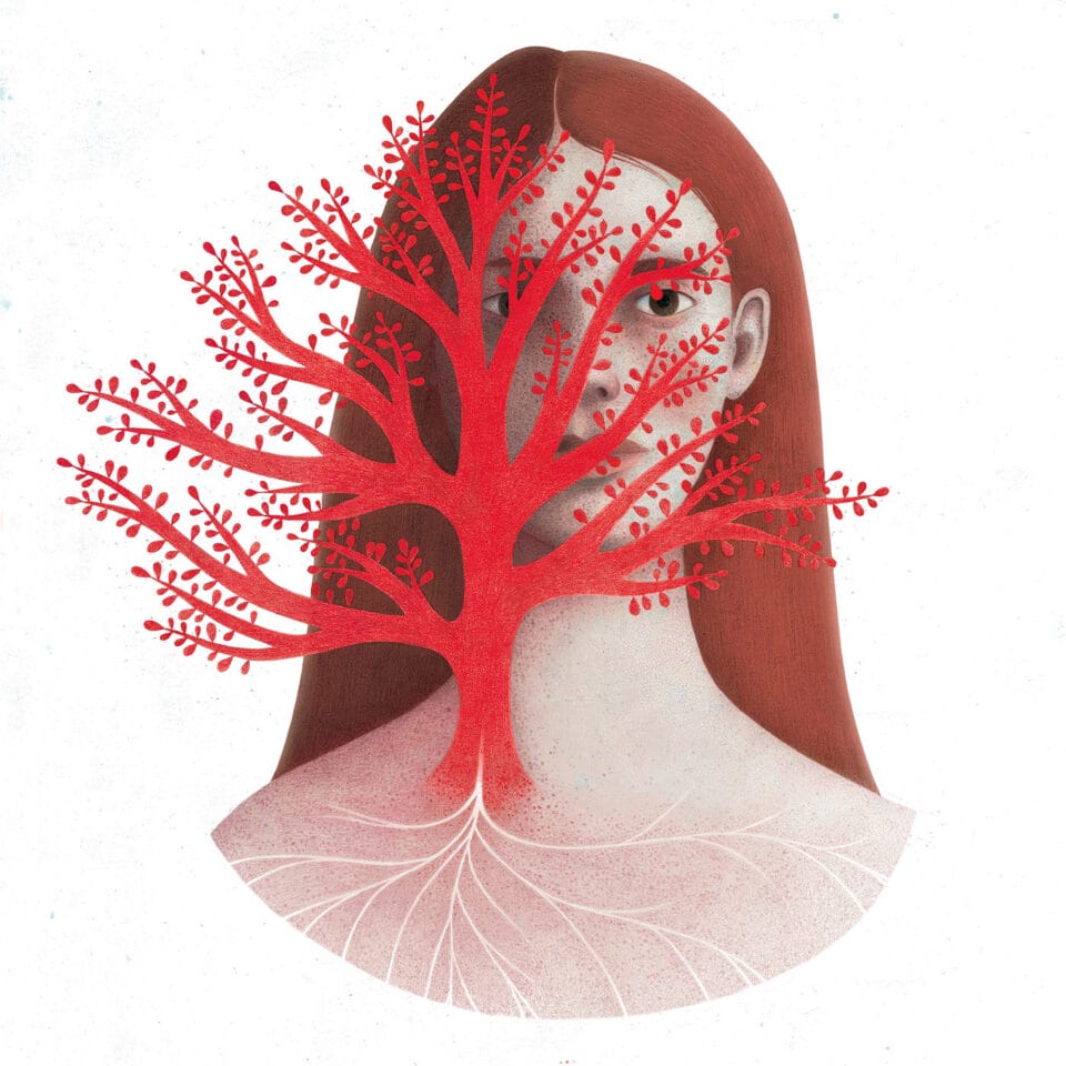 a red tree appears to grow out of the chest of a red-headed woman