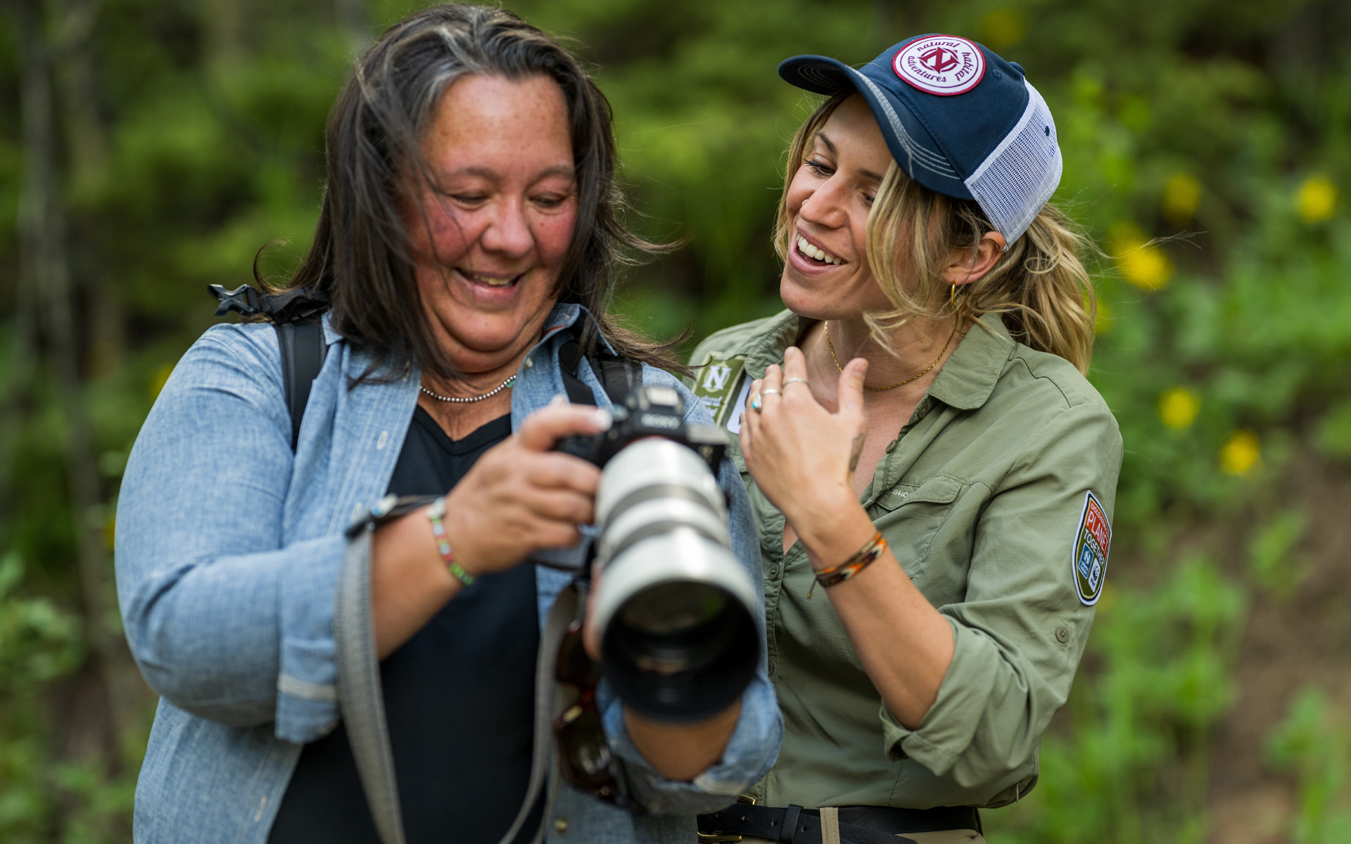 Nat Hab guest and photo expedition leader naturalist guide taking pictures in nature wilderness