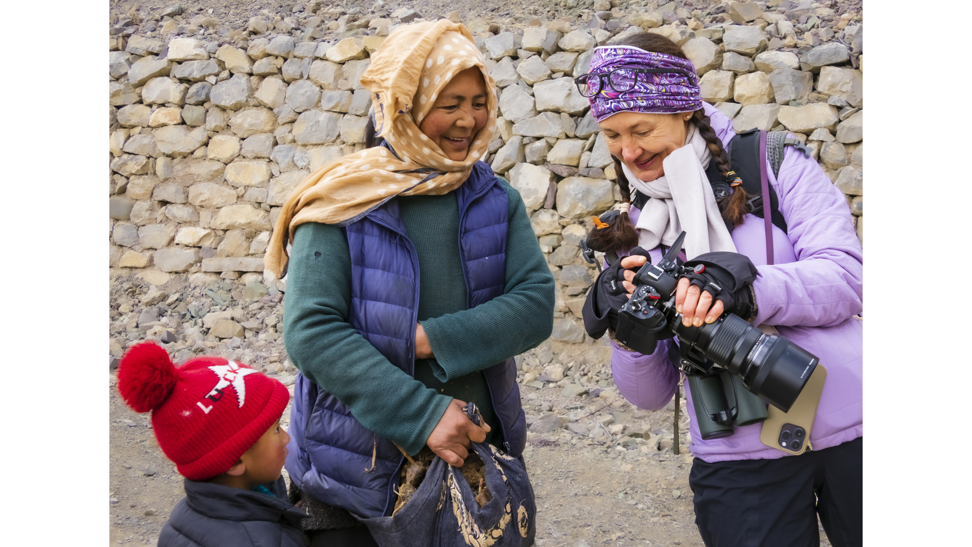 Phtoographer sharing images in Mangyu Village, Grand Himalaya Range, Ladakh, India