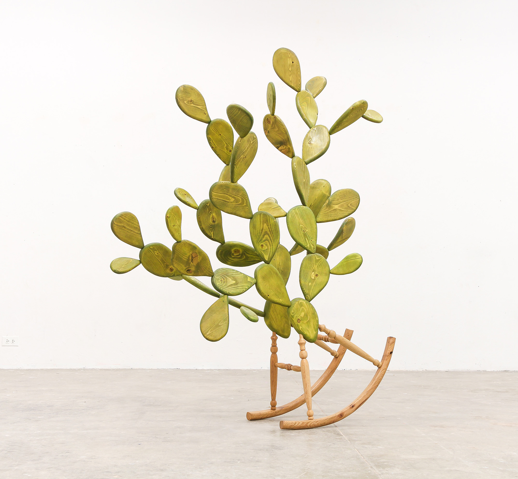 a cacti on a rocking base by Raul De Lara